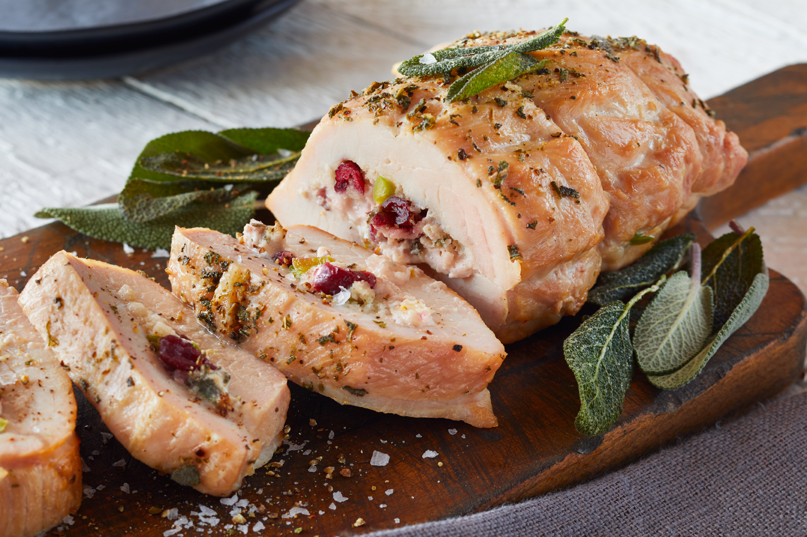 Cranberry Jalapeño Pork Tenderloin on a cutting board