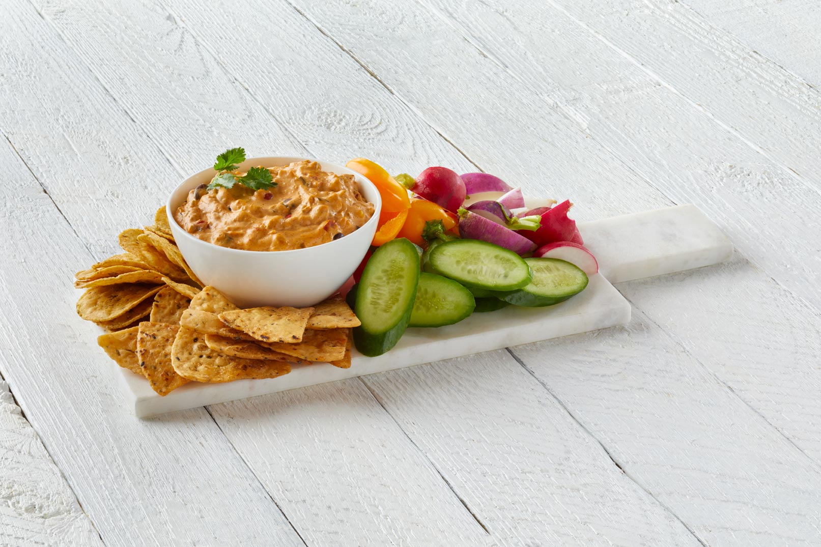 Platter of veggies, chips and dip